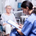 Nurse writing prescription for disabled senior woman in wheelchair after medical examination. Recovery treatment, help for disabled people. Elderly assistance SSUCv3H4sIAAAAAAAACpxV247jNgx9L9B/GPi5AnS/7K8UfaAleWKsbQW23HYxmH8vfY2cDWaBPiSIyCOKPCRPPn7/7e2tqmFqffXt7WM54bntunnKI+Q2DWimf+z2MQ4hjqUlhjansYWuNNaQ/W2APqJxmLtuMX+uzmrKkOcpTsVjfevHNOXkv9/xVXSwI04YI/RTbtdA3BzmHtH3W8rpAvapS/NYp39LY92+b5EXODrE4Zhuc85xXJ2X4Pc0BHWxQAf9j6slpDr+fLVPC1+xi30c8lS+FuI9Te0jaW4KSjzk+I4cXkg5OvLndn47HFupkNFVVXv4raC5Xm2HaQv+v25uP/46q32Pg18I+Pgssh6xTtgauedYcQkCItWkscoR6SwQpykl1hkamfPOAxwvV9ZZZq2rSSOahkjKHHG158QLHxqrG6mMOMGqkbVmMhCvGkWkqi0Bi18RAhXaO+eVPME64F3mLOEeBEbmawaBgDCMh5oDC80JZpppSZUgXgLmrBuNOfuG2OgpRCEcV480ggleCQQ3inoEx0gsNIxQa2tHvQxSqJXGjbvq+z84Yv3a1p01mEObijb/nTx066gU1N7H1rfDe3Et5du6dsc1n+Yhjz/KVlZdSneou2VVGowZD/sNpgnh4bCXk4dLnvrinSHltaN71CrgaC5HJrii+LFUMuoMFzvb+zrfWoyzpnMkON+7BCEuj57j92LRNVXaUsP1OY/Xnd8A0nH7AFy3/wXgIgSrXzFzaNMLTXiFeZKHHaLEISyFULzyHZLx0leKxwbQSqmywCcZ2UDW6QL0rCgrxjHK1kF6rP+y3X2LtVxbcU3eSit+UfsV8qIGh5iv0zMUF829JskYJq37BQfGaGXUF6NijGWSf91pbLQ0eifp8seEwDaUGnyQVDEphDGS23PZnjiqmFWar0N0Qi4cVcIJjttjHiGeKaowPhOOOv4IsTOEwiN4dCoQDYDCE2pJ6mApCU4YqK06b/zEW8VwLKjij7wurFWc4jIrVTz6TBqmjvOrtBartO10tcs8VSICdQq1FZUVpVYHR8BElH1Jm4ZHzDkutz7/AwAA//8DAGK9gLBmCAAA